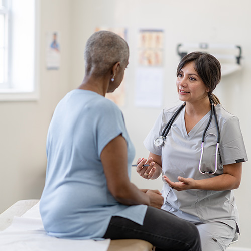 Doctor performing surgery with a team